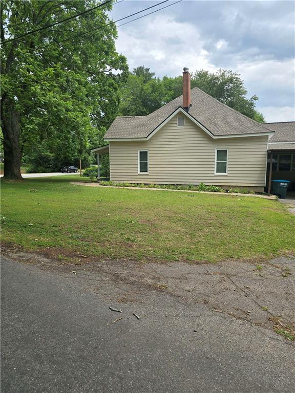 2863 Maysville Road Commerce, GA 30529 - Photo 14 of 15 a view of a house with a yard