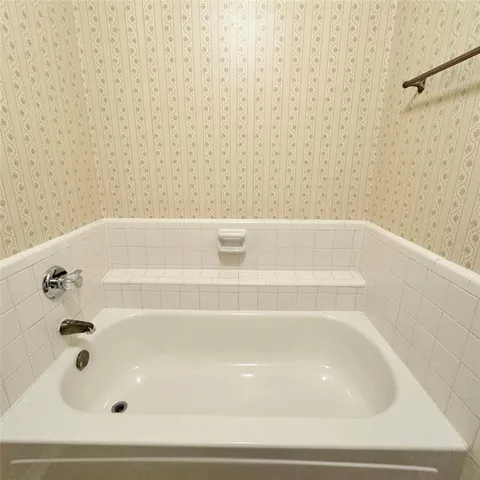 a bathroom with a bathtub