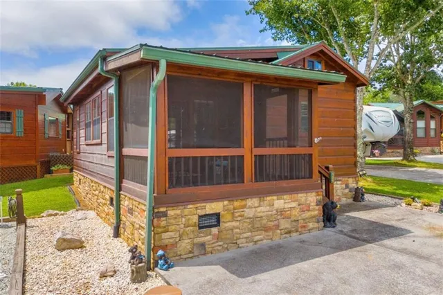 a view of a balcony with two chairs