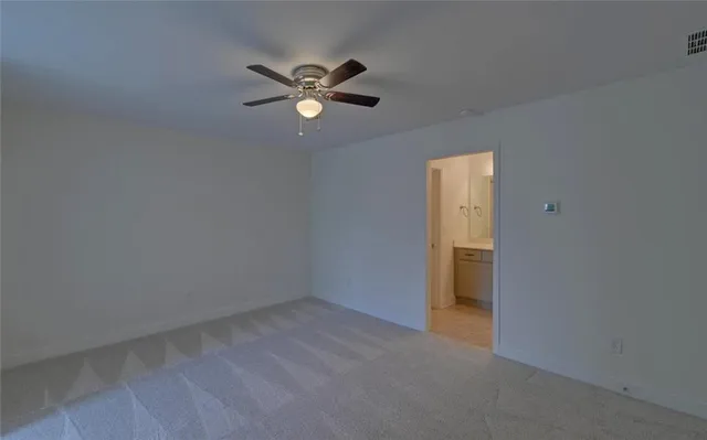 a view of a livingroom with a fan
