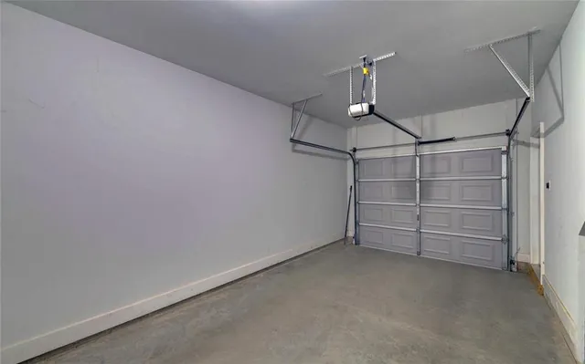 a view of an empty room and closet area