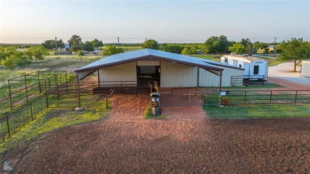 a childrens park with lots of swings and slides