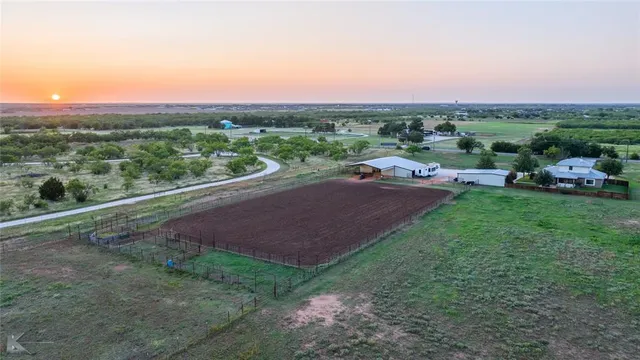 a view of a street with a houses