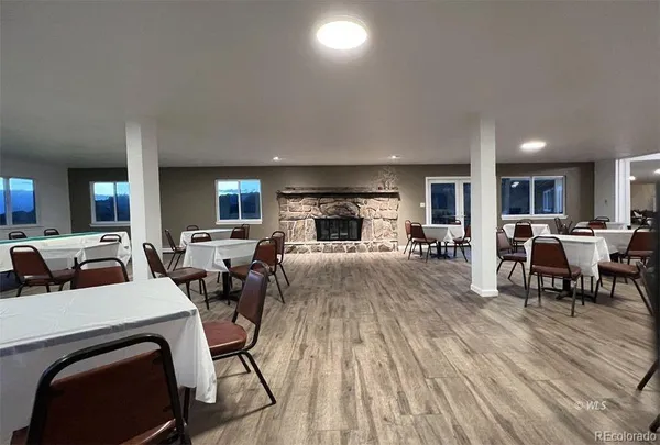 a living room with furniture and a table