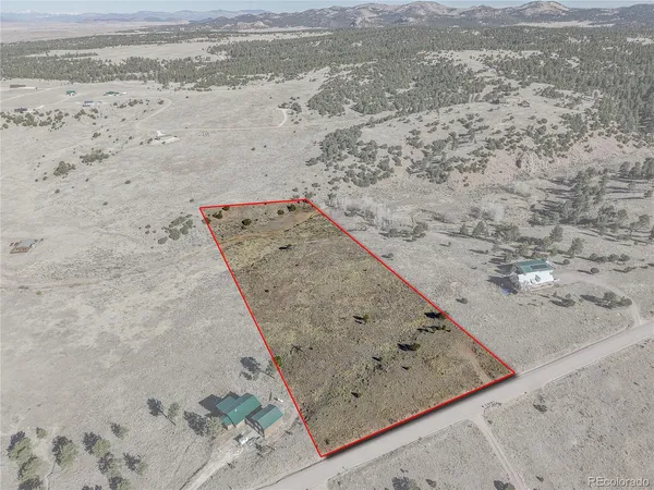 a view of beach and mountain