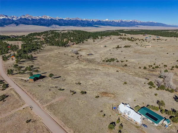 an aerial view of beach with ocean view