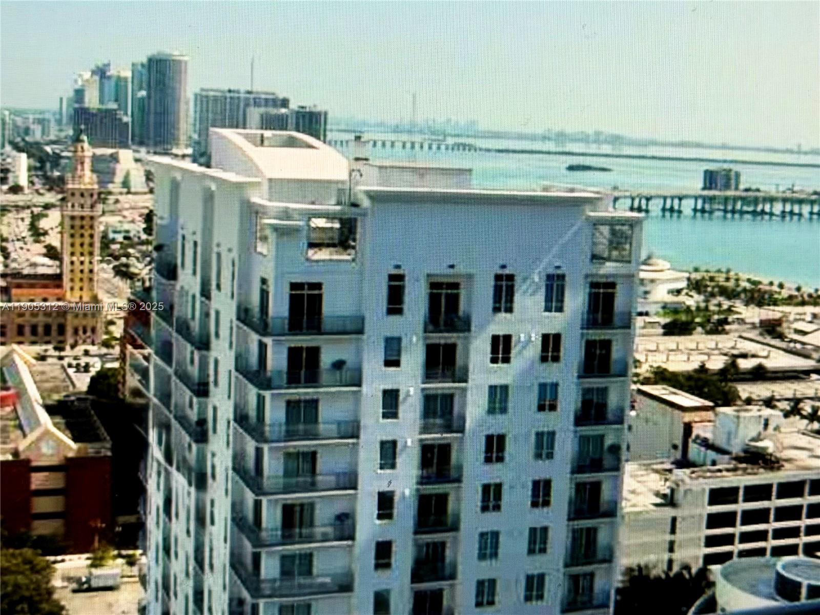 133 Northeast 2nd Avenue, Unit 2611 Miami, FL 33132 - Photo 4 of 15 a view of a city with tall buildings