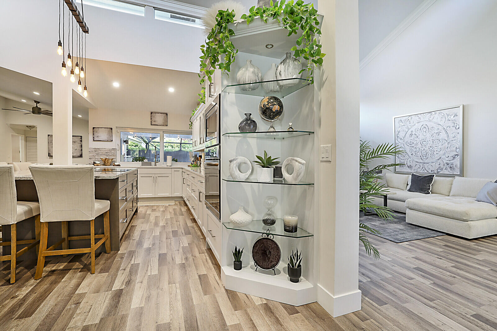 2155 Rabbit Hollowe Circle Delray Beach, FL 33445 - Photo 12 of 71 a living room with furniture and a wooden floor
