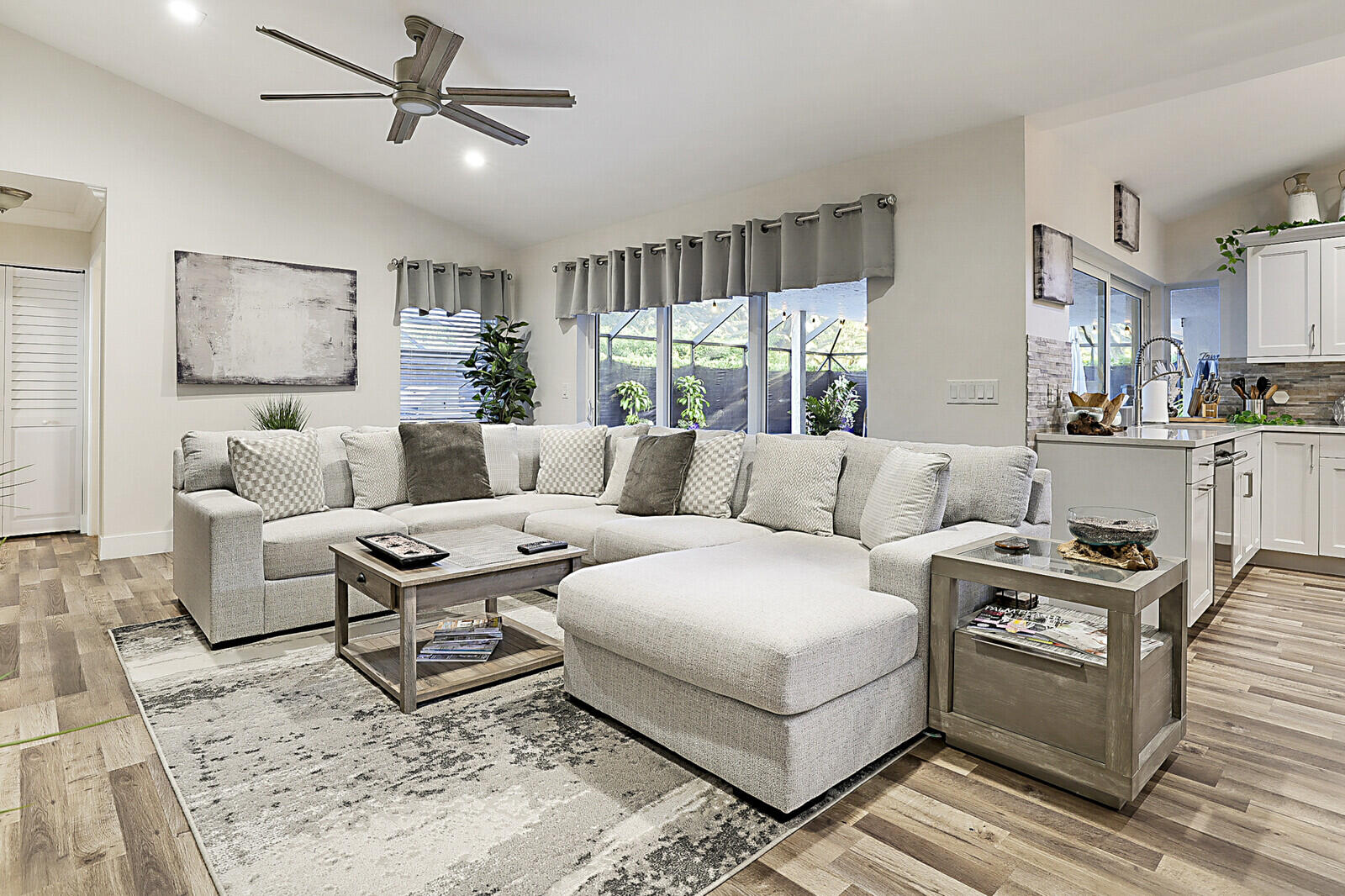 2155 Rabbit Hollowe Circle Delray Beach, FL 33445 - Photo 19 of 71 a living room with furniture and a window