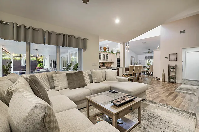 a view of a swimming pool with a patio