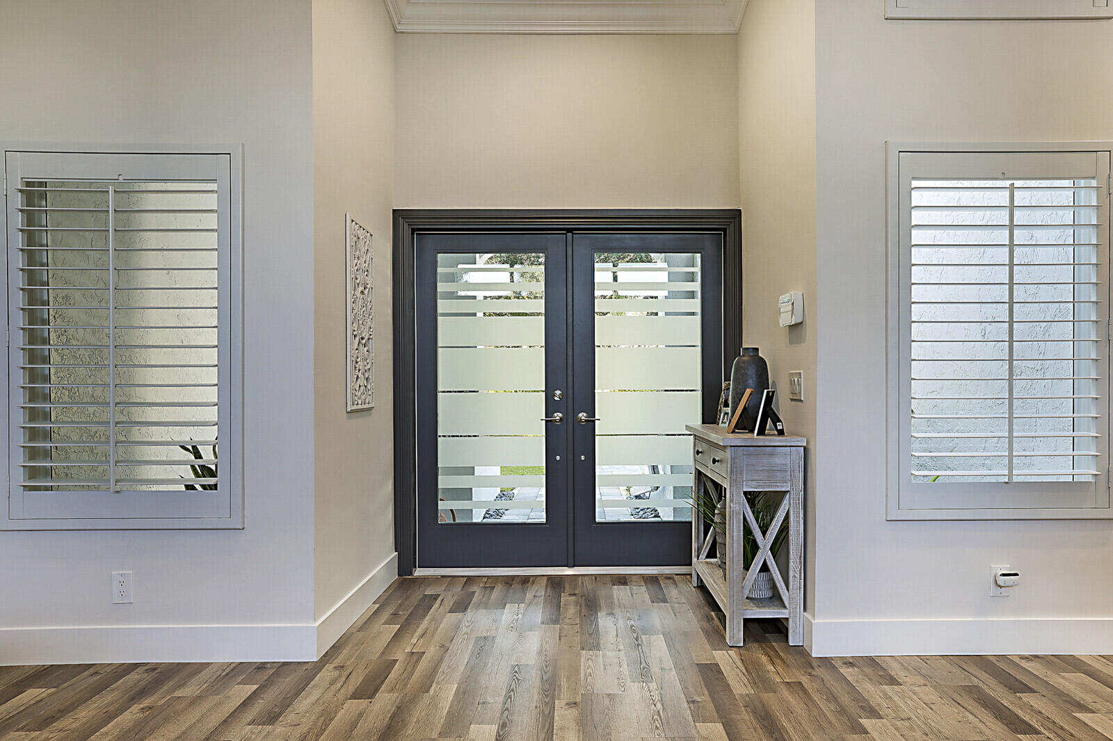 2155 Rabbit Hollowe Circle Delray Beach, FL 33445 - Photo 3 of 71 a view of a livingroom with a white car and a window