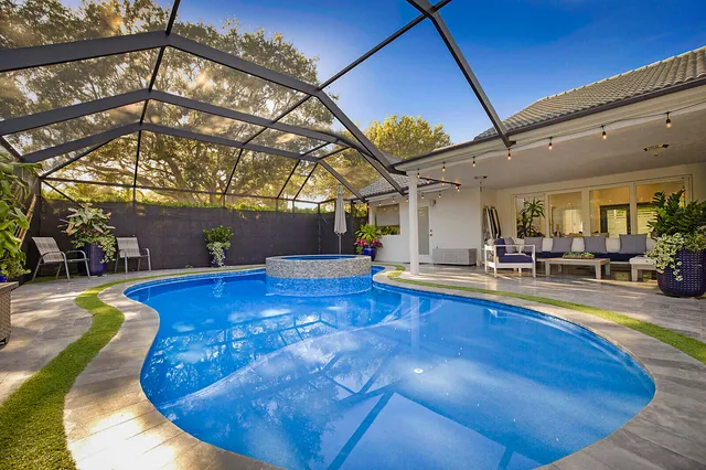 a view of a swimming pool with a sitting space