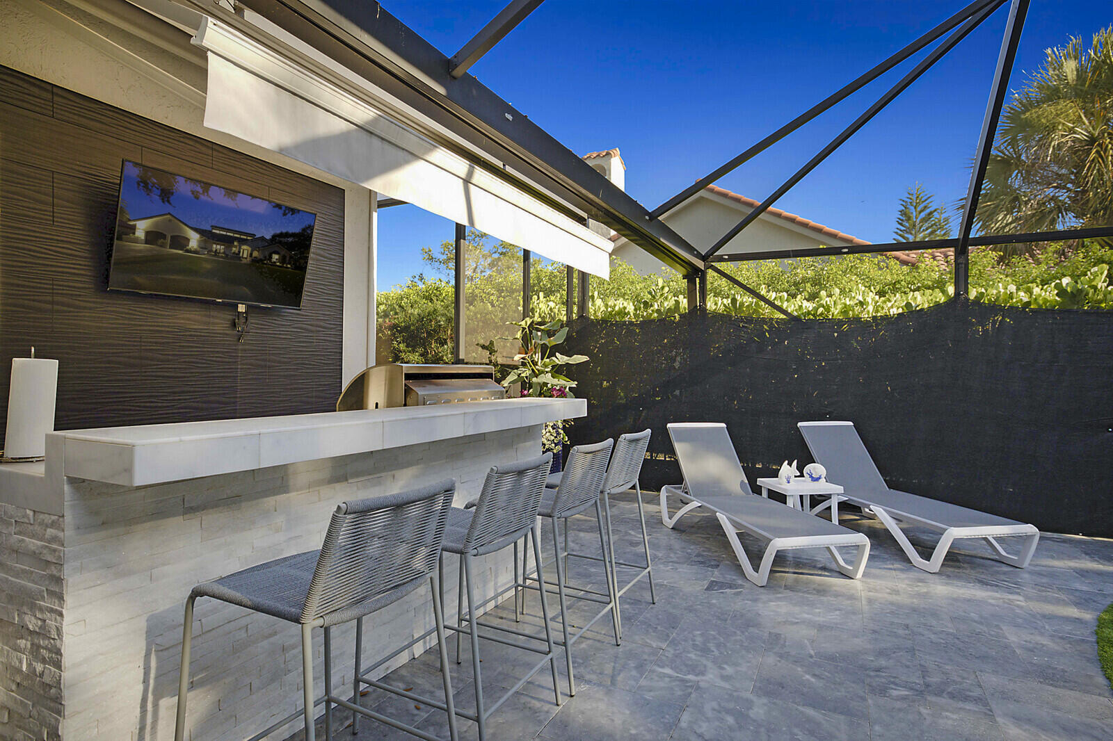 2155 Rabbit Hollowe Circle Delray Beach, FL 33445 - Photo 41 of 71 a view of an outdoor sitting area with furniture