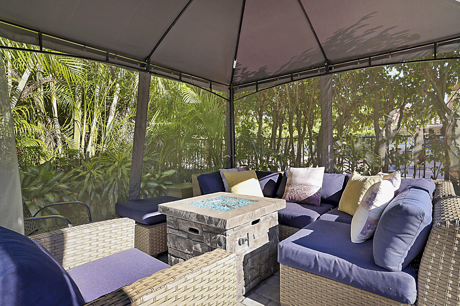 2155 Rabbit Hollowe Circle Delray Beach, FL 33445 - Photo 49 of 71 a outdoor living space with furniture and garden view