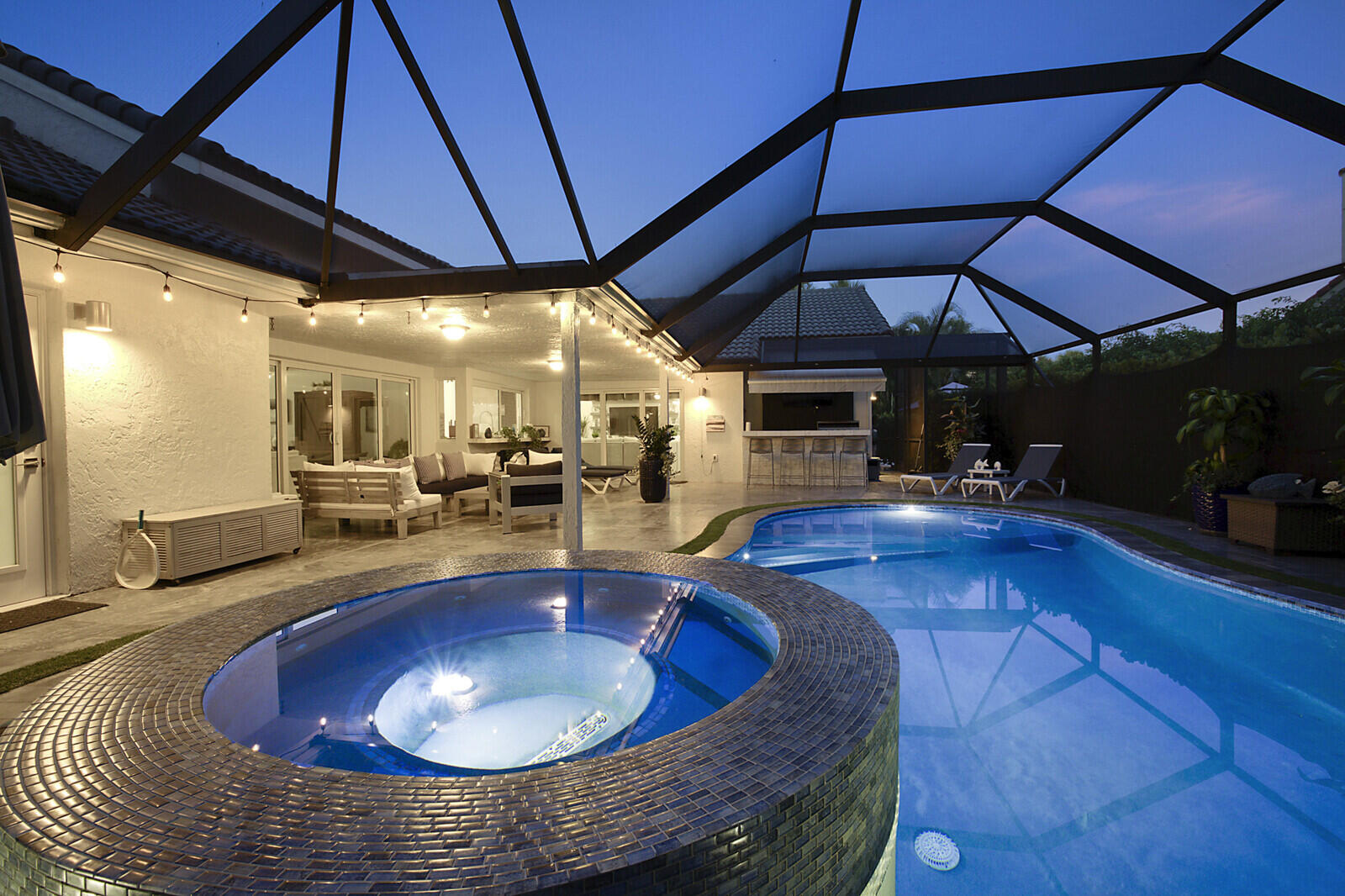 2155 Rabbit Hollowe Circle Delray Beach, FL 33445 - Photo 59 of 71 a view of a swimming pool with chairs in patio