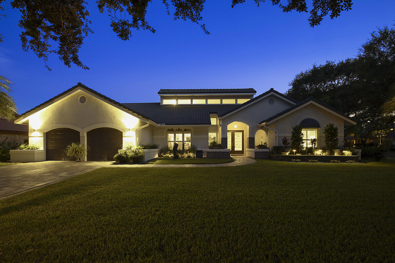 2155 Rabbit Hollowe Circle Delray Beach, FL 33445 - Photo 68 of 71 a front view of a house with yard and green space