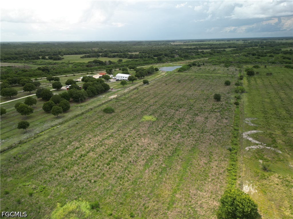 3rd Road LaBelle, FL 33935 - Photo 15 of 19 a view of a pathway with a field