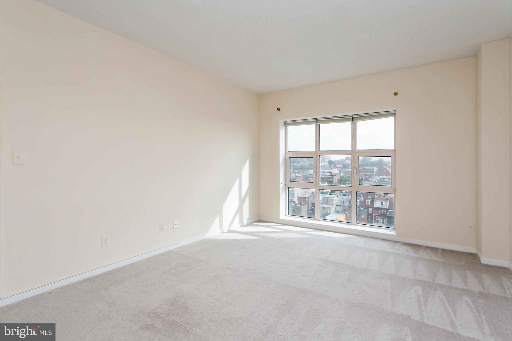 250 President Street, Unit 609 Baltimore, MD 21202 - Photo 7 of 28 Bright and airy space with city views.