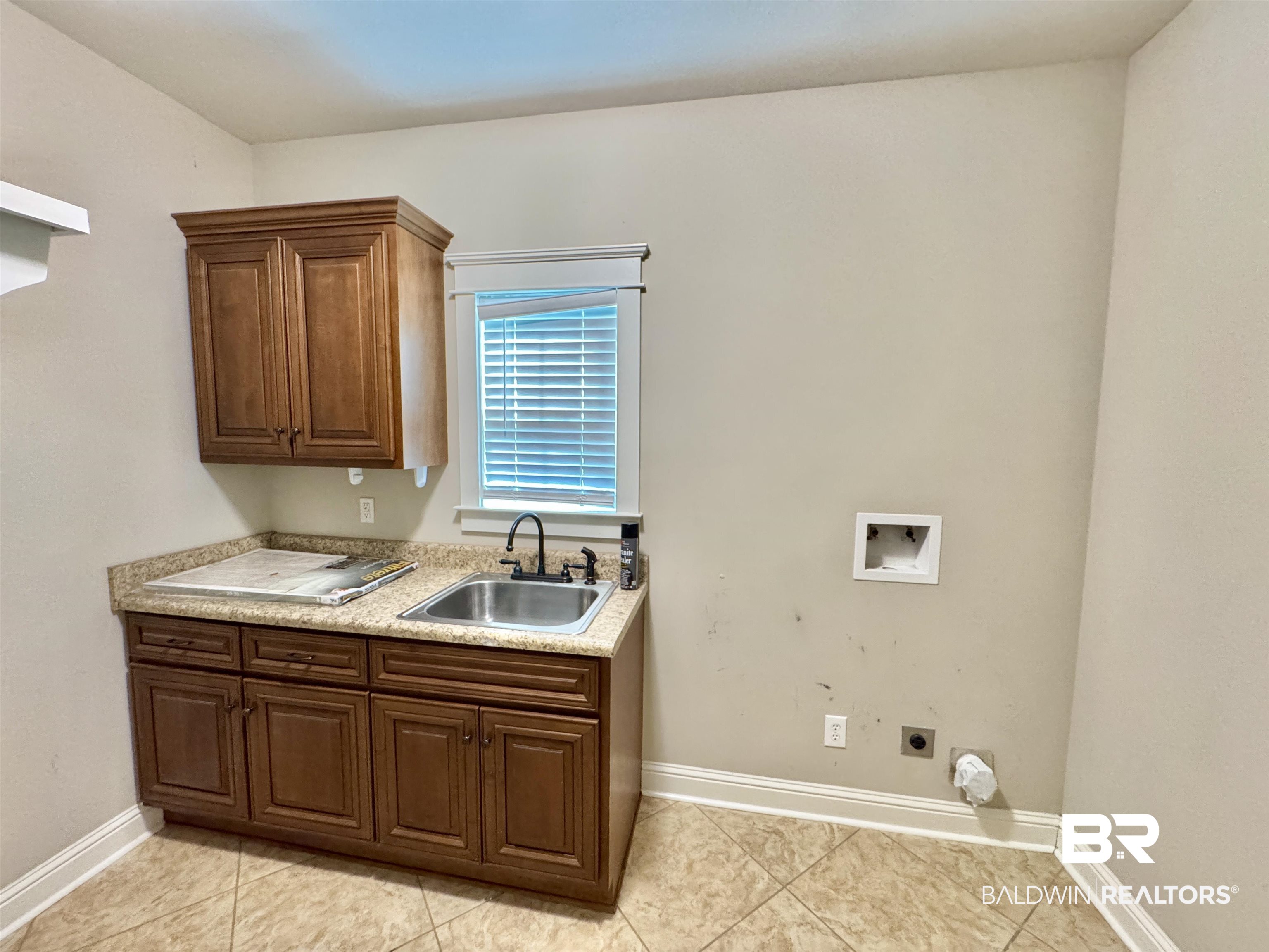 10846 County Road 138 Bay Minette, AL 36507 - Photo 7 of 53 Laundry area with hookup for an electric dryer, sink, hookup for a washing machine, and light tile patterned floors