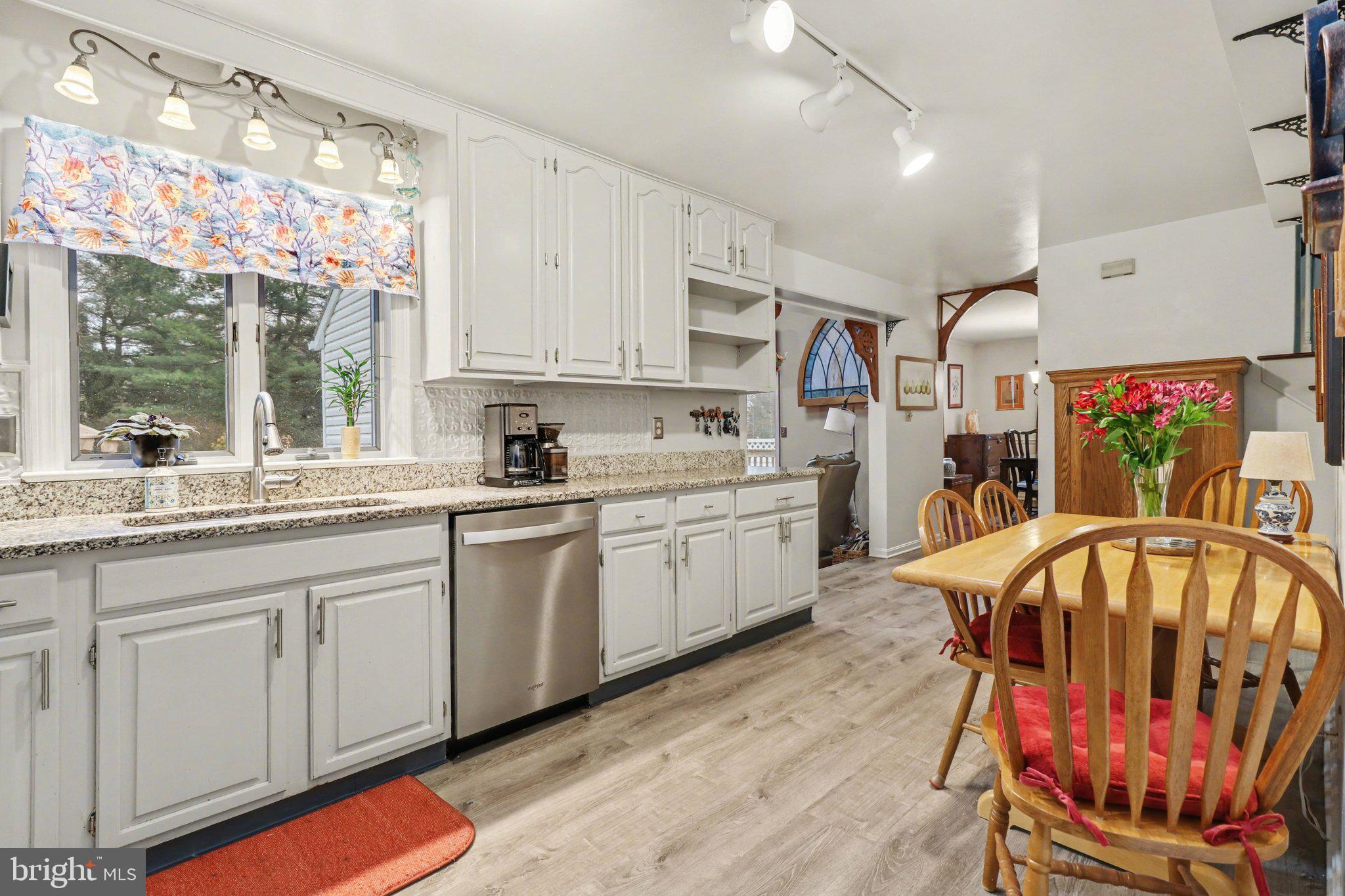 1014 Shadowstone Drive Lancaster, PA 17603 - Photo 14 of 54 a kitchen that has a lot of white cabinets a sink and appliances