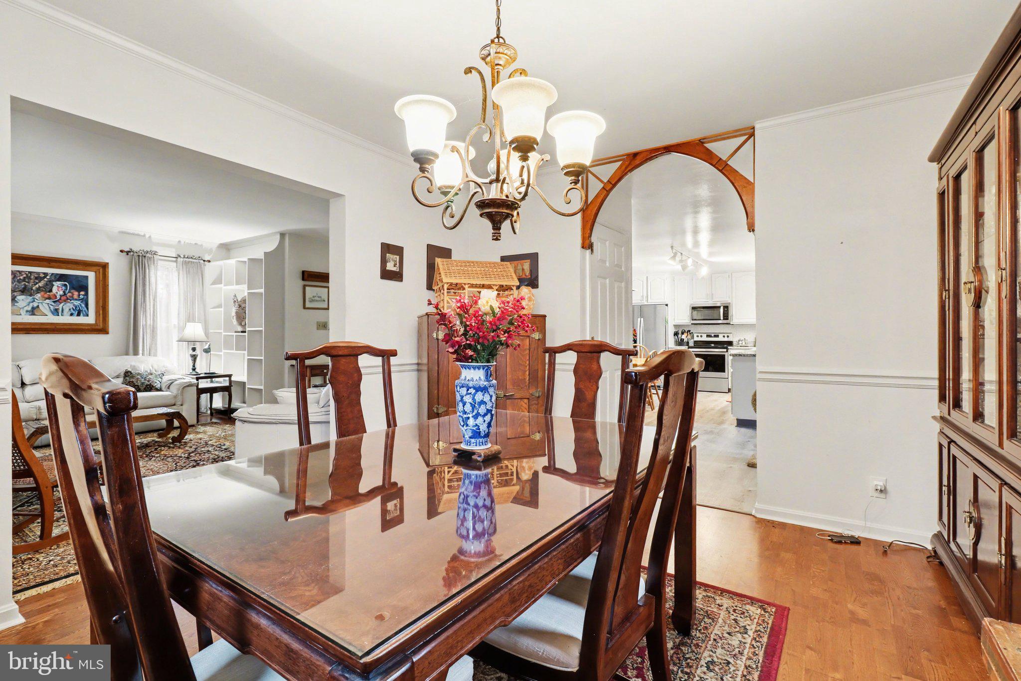 1014 Shadowstone Drive Lancaster, PA 17603 - Photo 21 of 54 a view of a dining room with furniture and a chandelier
