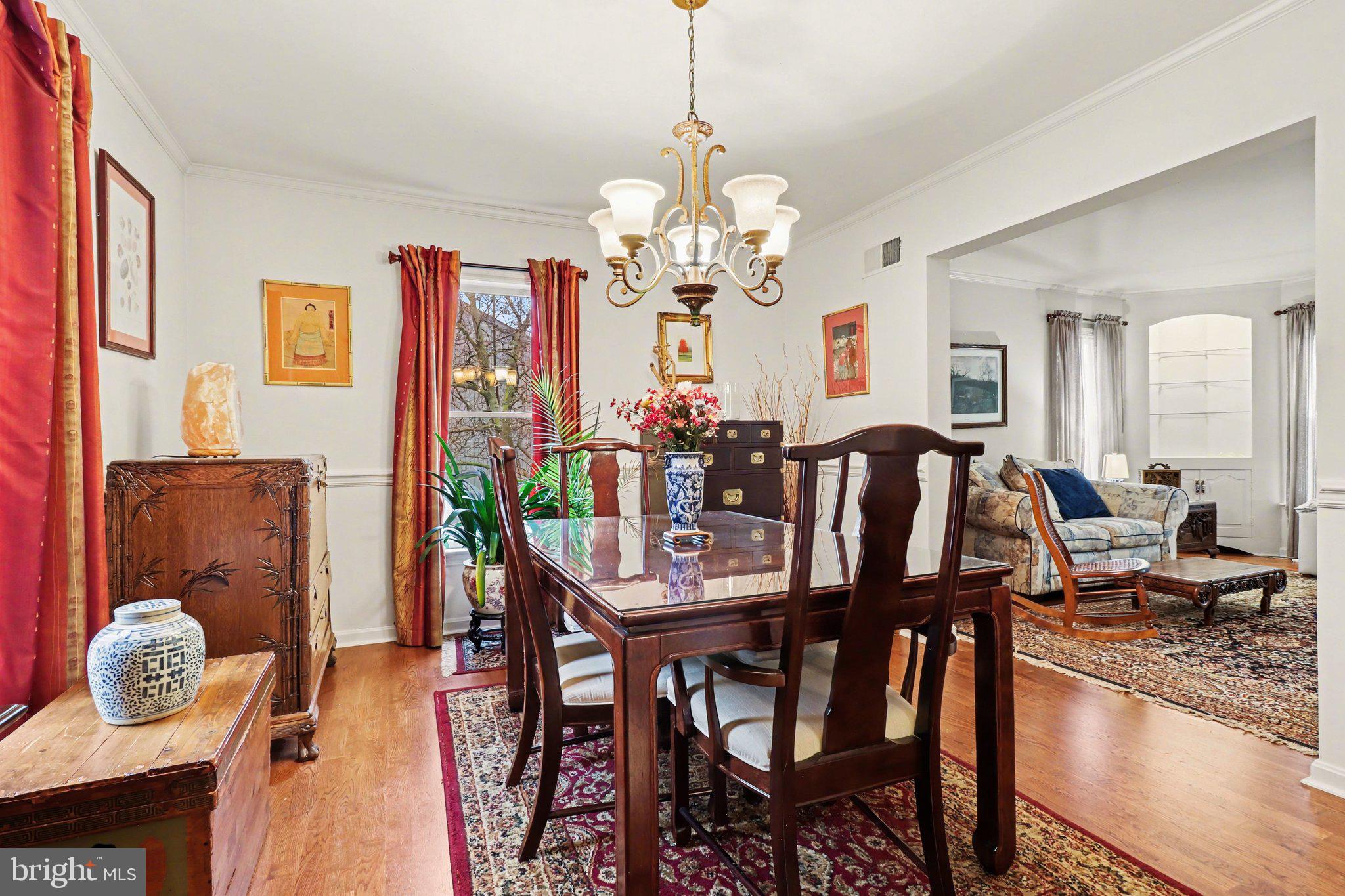 1014 Shadowstone Drive Lancaster, PA 17603 - Photo 23 of 54 a view of a dining room with furniture wooden floor and chandelier