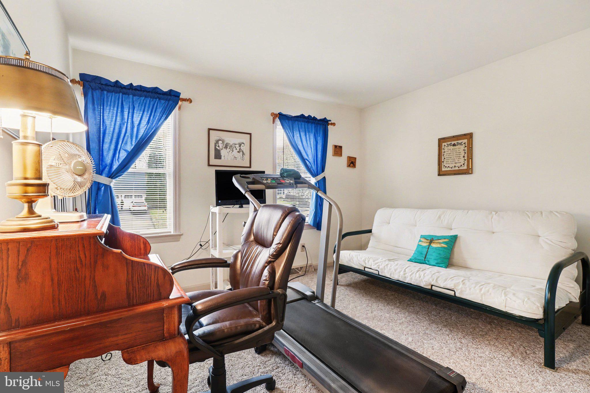 1014 Shadowstone Drive Lancaster, PA 17603 - Photo 29 of 54 a living room with furniture and a wooden floor