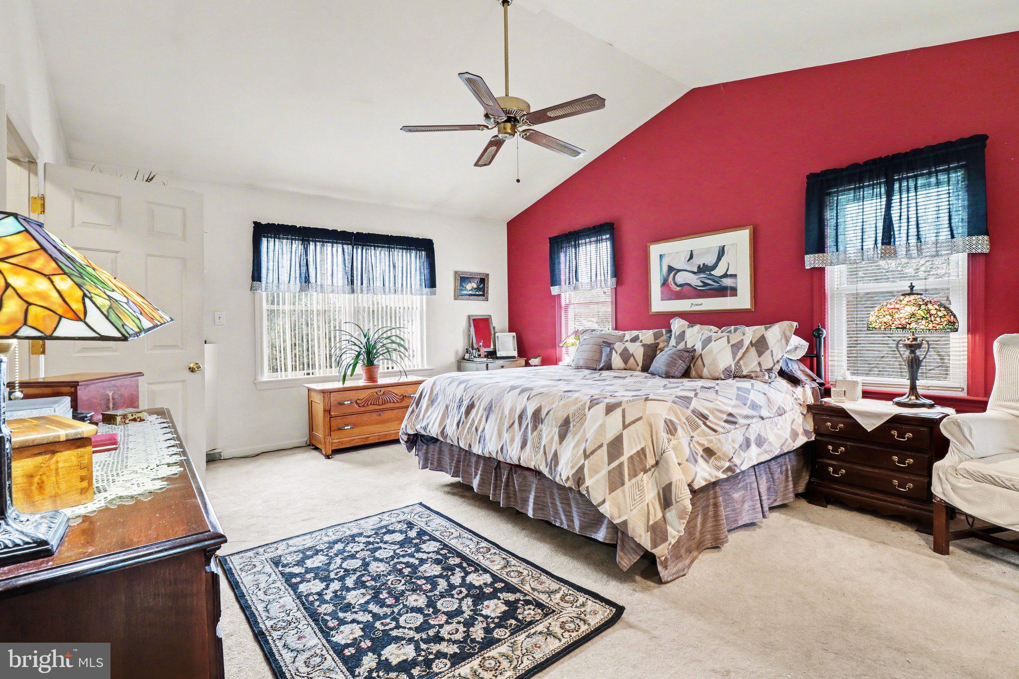 1014 Shadowstone Drive Lancaster, PA 17603 - Photo 33 of 54 a bedroom with a bed a couch and dresser