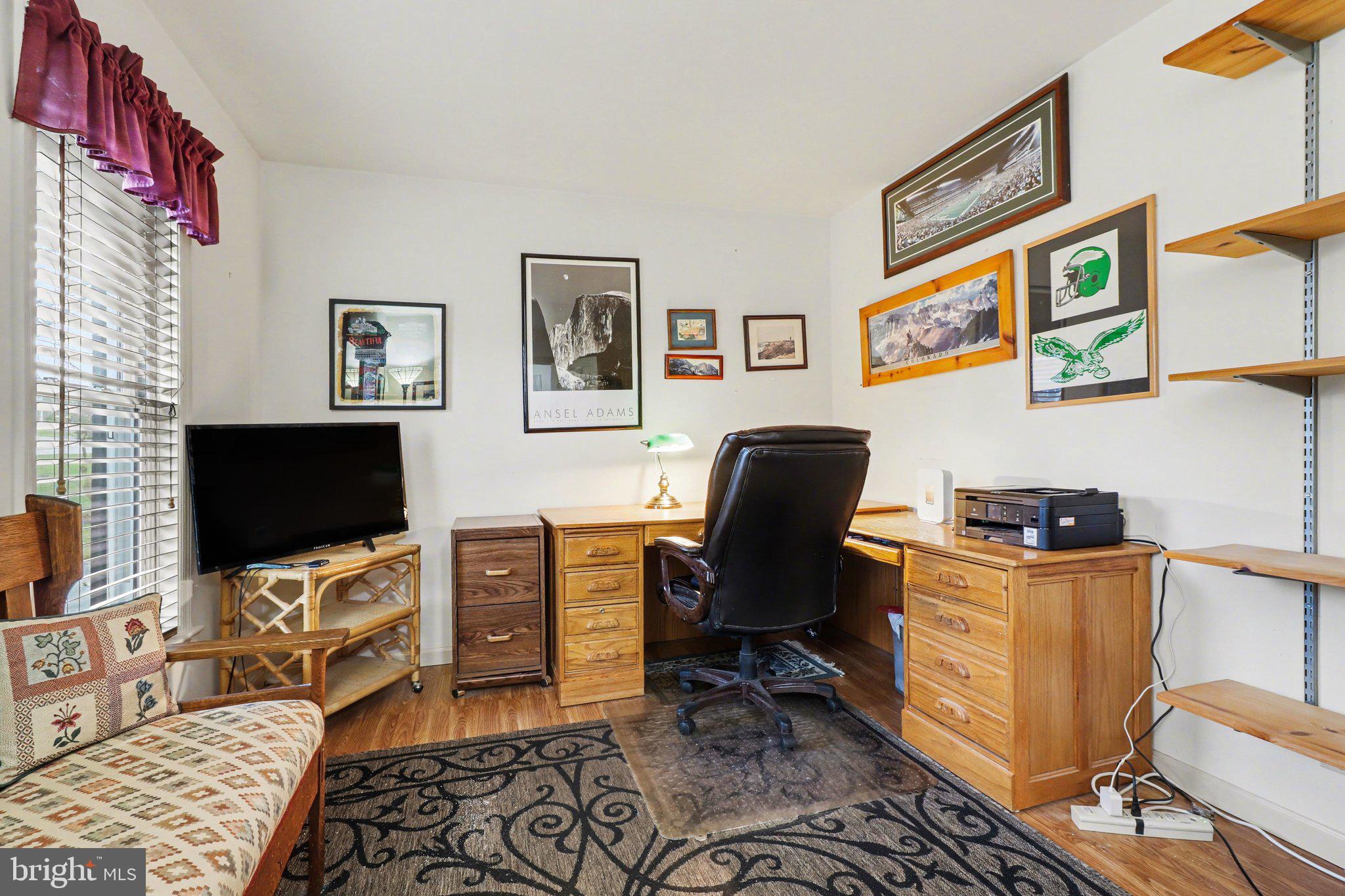 1014 Shadowstone Drive Lancaster, PA 17603 - Photo 41 of 54 a view of a workspace with furniture and a flat screen tv