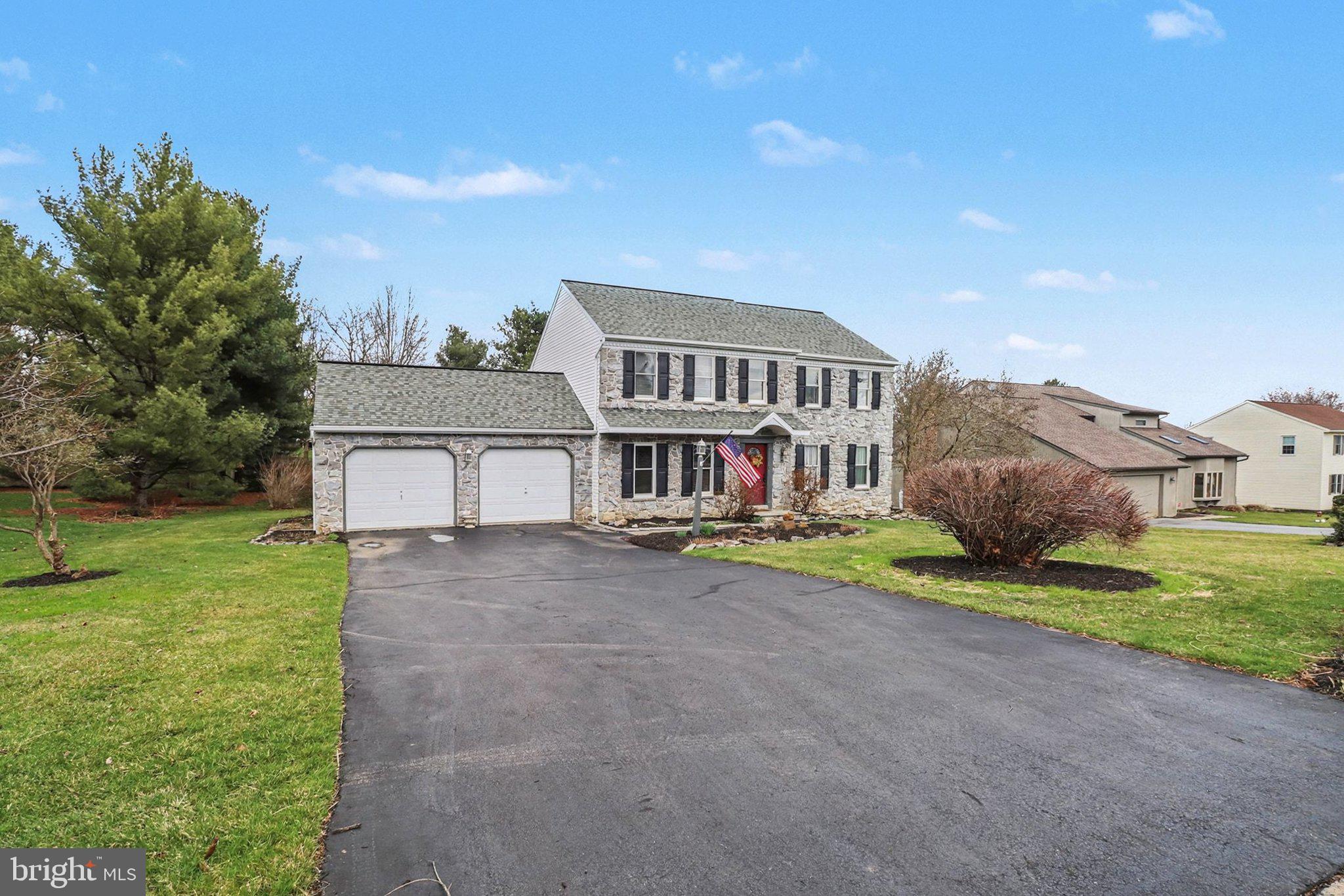 1014 Shadowstone Drive Lancaster, PA 17603 - Photo 6 of 54 a front view of house with yard and green space