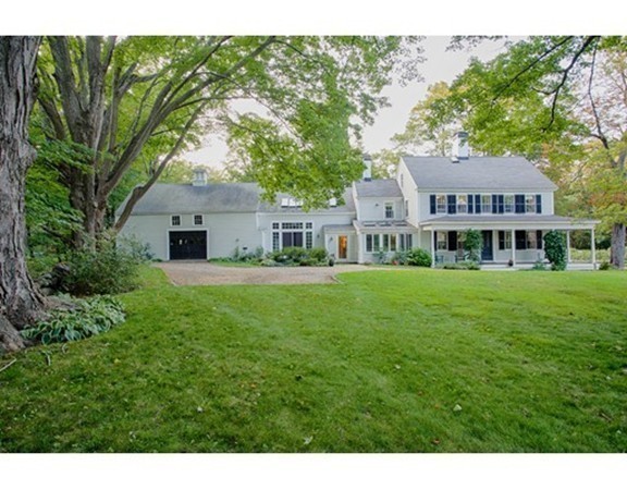 938 Bay Road Hamilton, MA 01982 - Photo 1 of 30 a front view of a house with a garden