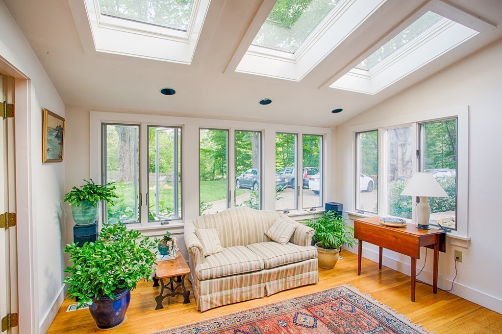 938 Bay Road Hamilton, MA 01982 - Photo 14 of 30 a living room with furniture potted plant floor and a window