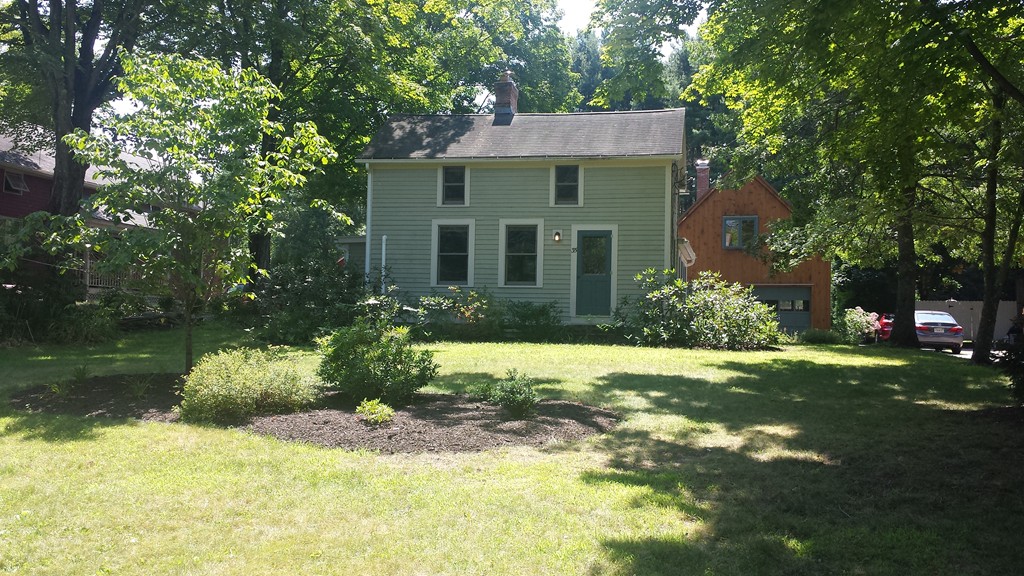 35 Pelham Road Amherst, MA 01002 - Photo 1 of 20 a front view of a house with a yard
