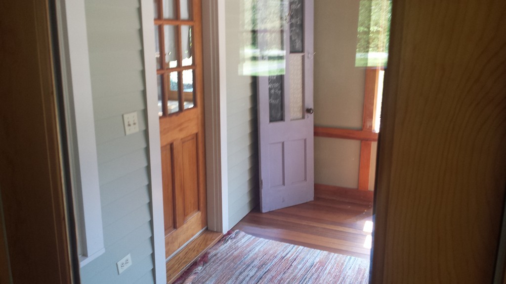 35 Pelham Road Amherst, MA 01002 - Photo 8 of 20 a view of a hallway with wooden floor and a bathroom