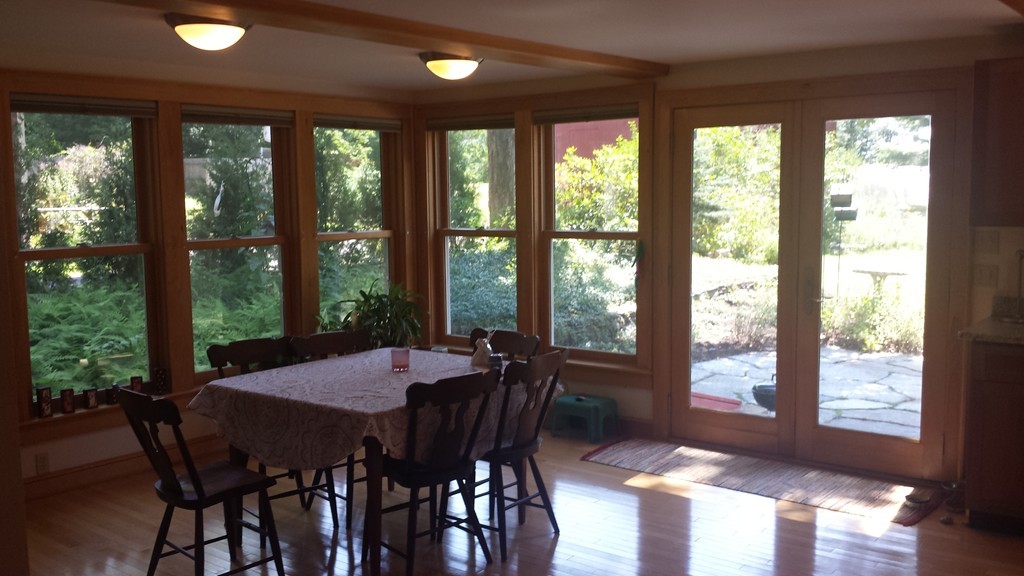 35 Pelham Road Amherst, MA 01002 - Photo 10 of 20 a view of a dining room with furniture window and outside view