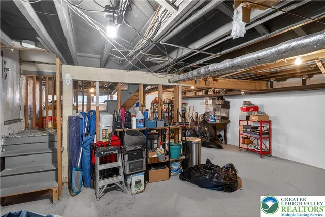 a view of a room with storage and utility room