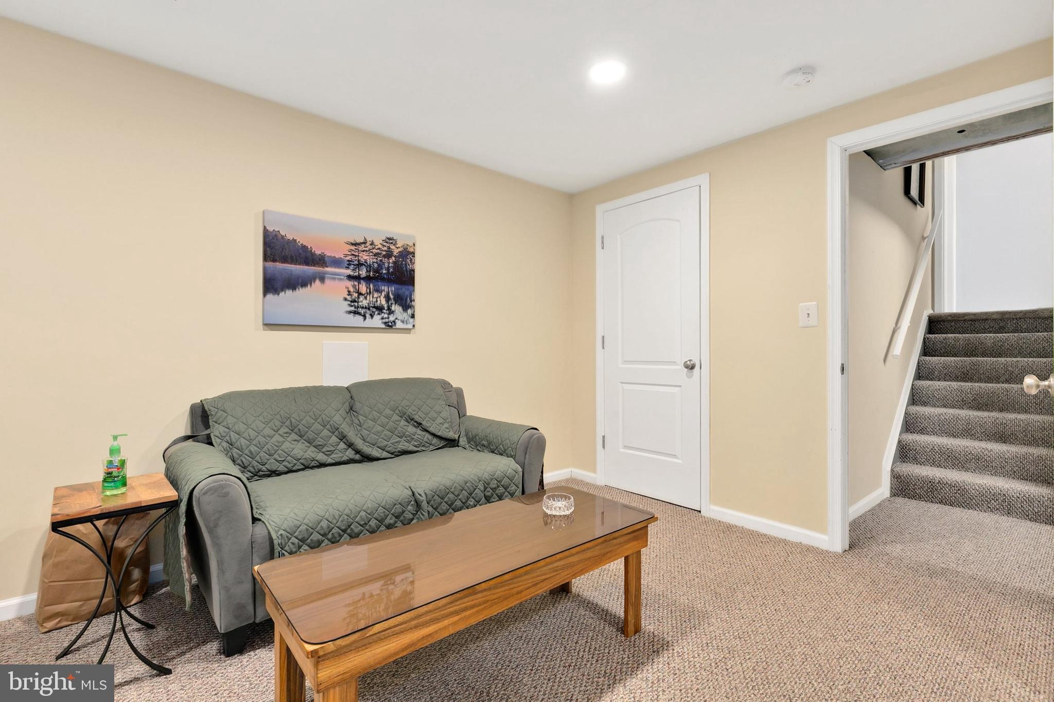 9348 Windbell Way Columbia, MD 21045 - Photo 24 of 37 a living room with furniture and a rug