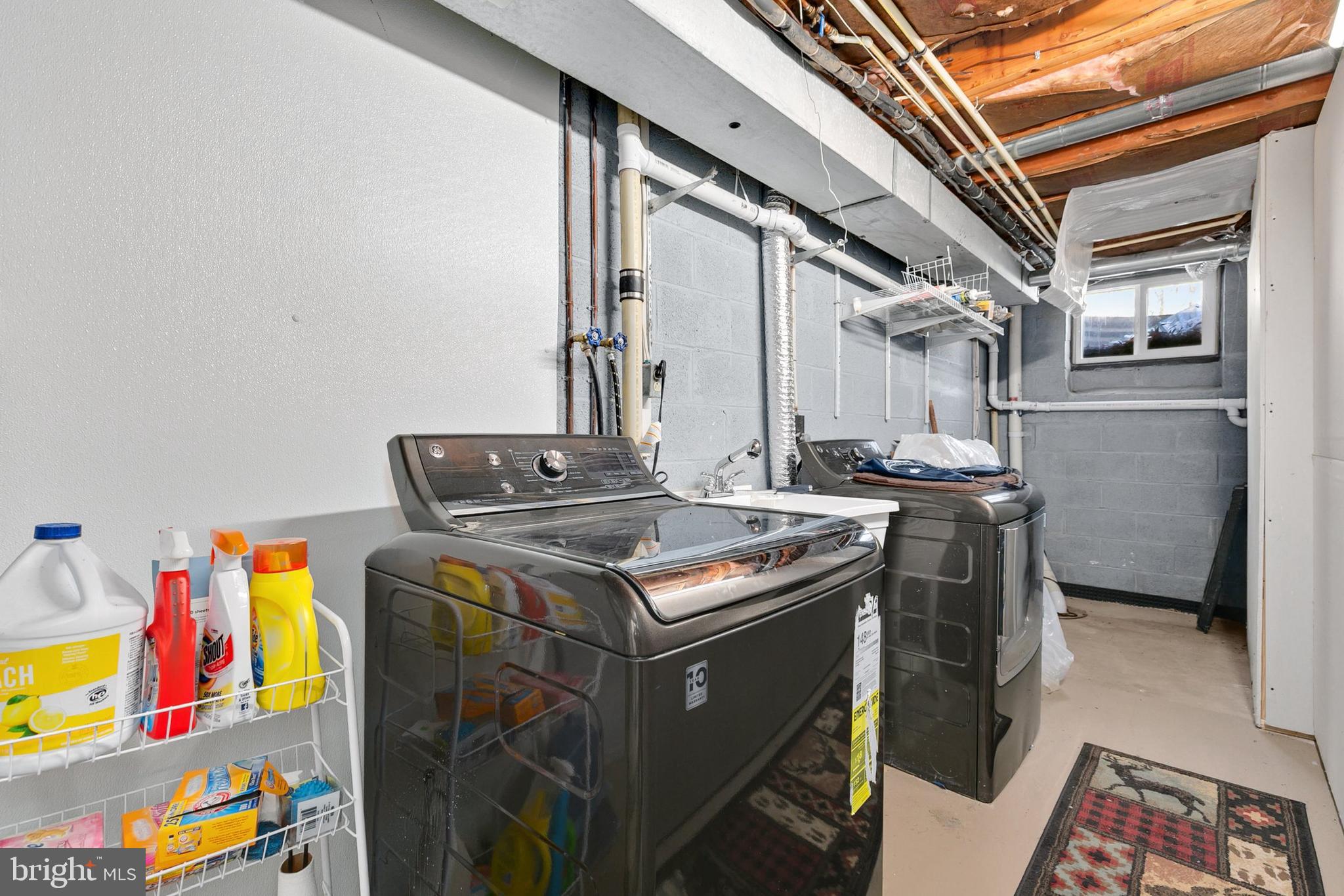 9348 Windbell Way Columbia, MD 21045 - Photo 28 of 37 a utility room with dryer and washer