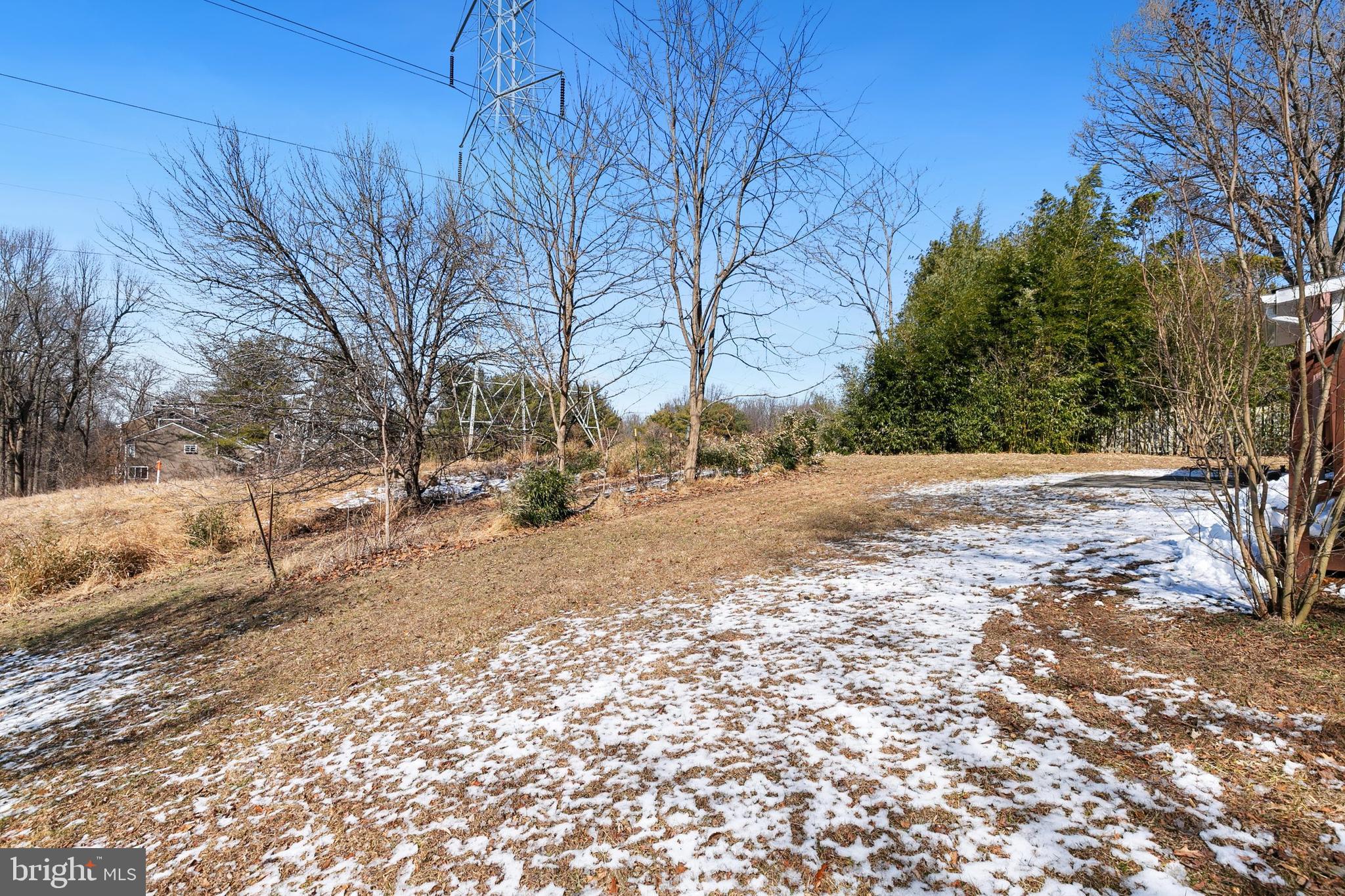9348 Windbell Way Columbia, MD 21045 - Photo 36 of 37 a view of road with large trees