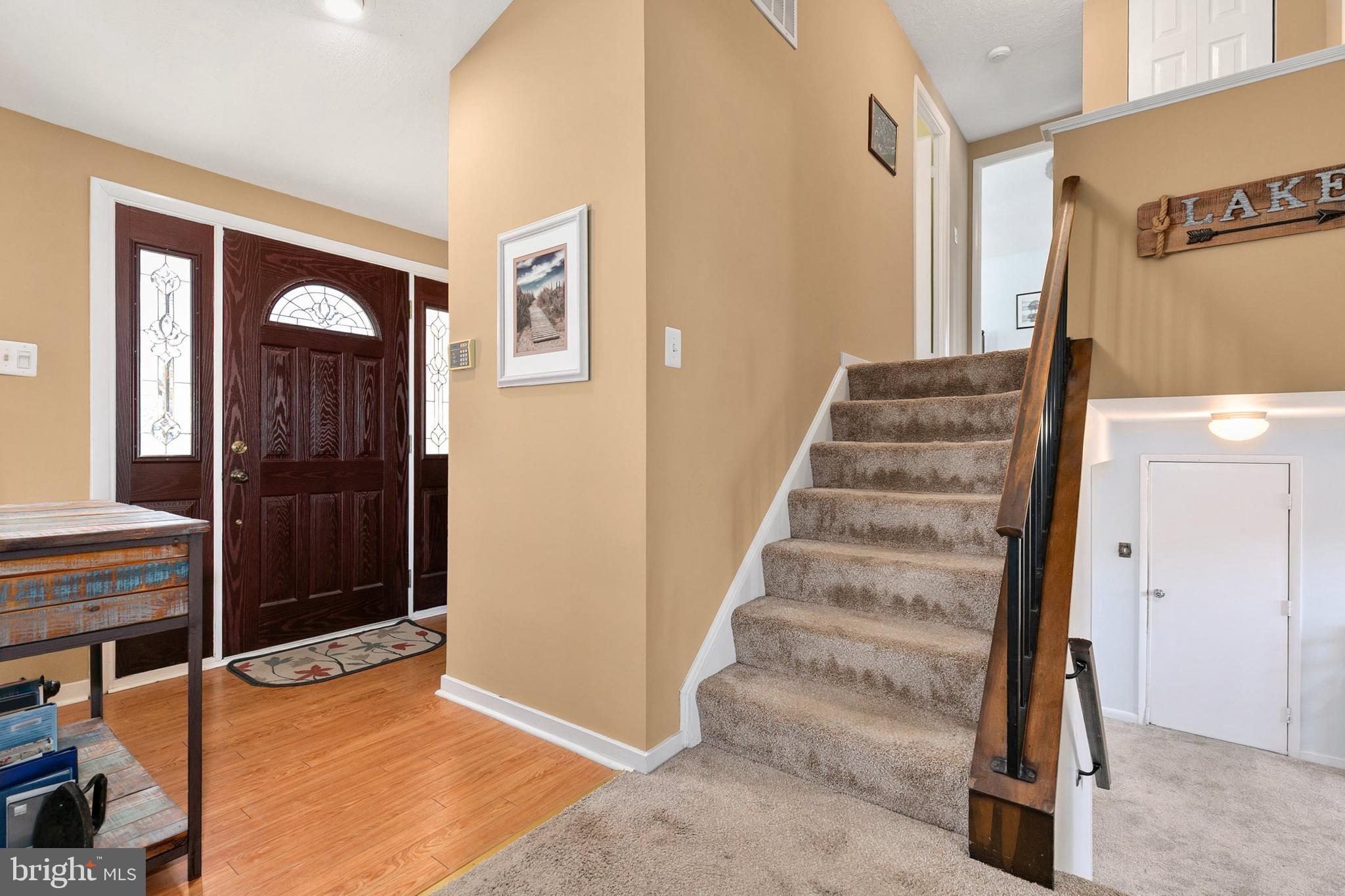 9348 Windbell Way Columbia, MD 21045 - Photo 4 of 37 a view of a hallway with staircase