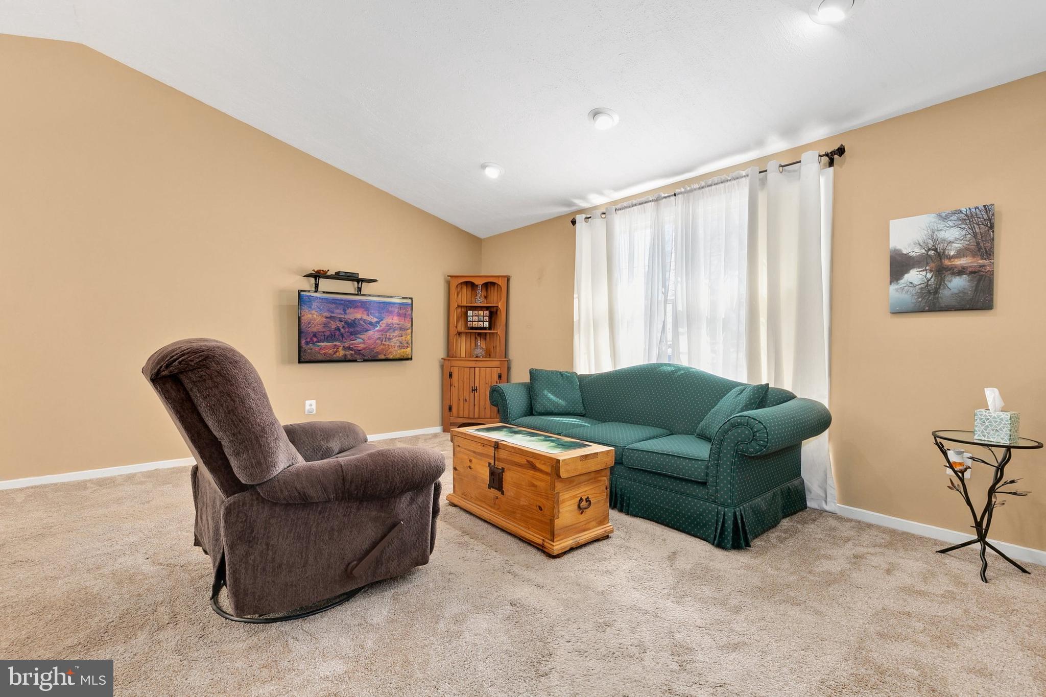 9348 Windbell Way Columbia, MD 21045 - Photo 5 of 37 a living room with furniture and a large window
