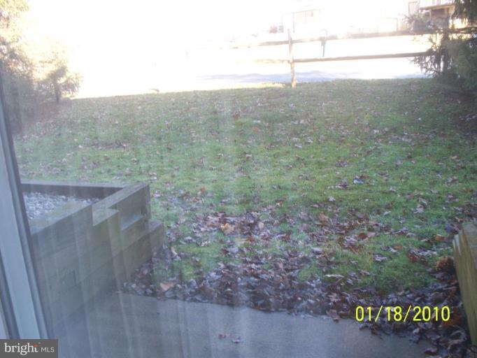 3928 Rolling Rd., Unit C3 Pikesville, MD 21208 - Photo 13 of 16 a view of a dry yard