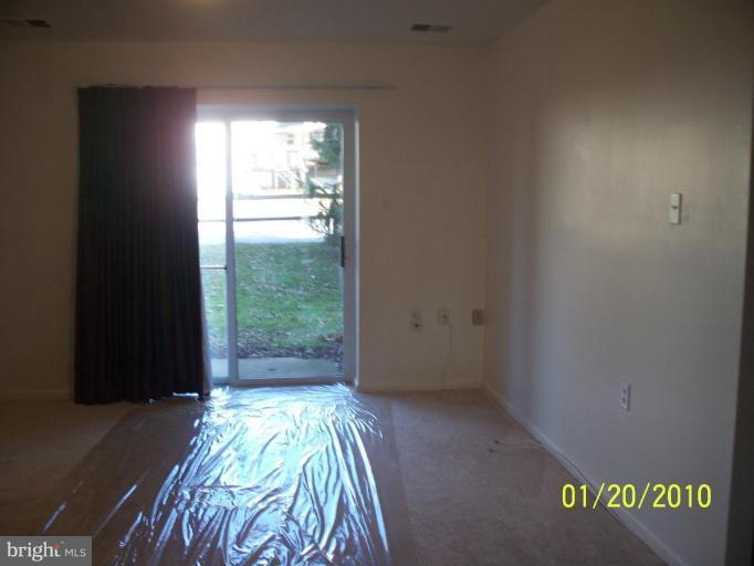 3928 Rolling Rd., Unit C3 Pikesville, MD 21208 - Photo 3 of 16 a view of hallway with window