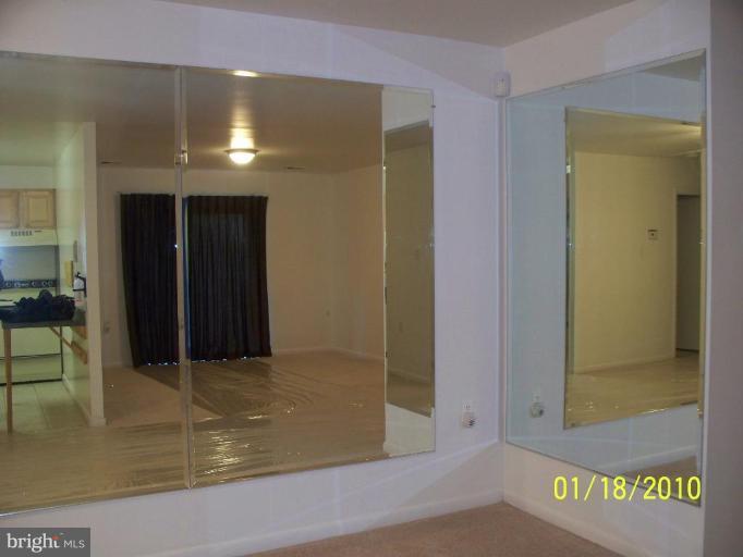 3928 Rolling Rd., Unit C3 Pikesville, MD 21208 - Photo 4 of 16 a view of a hallway