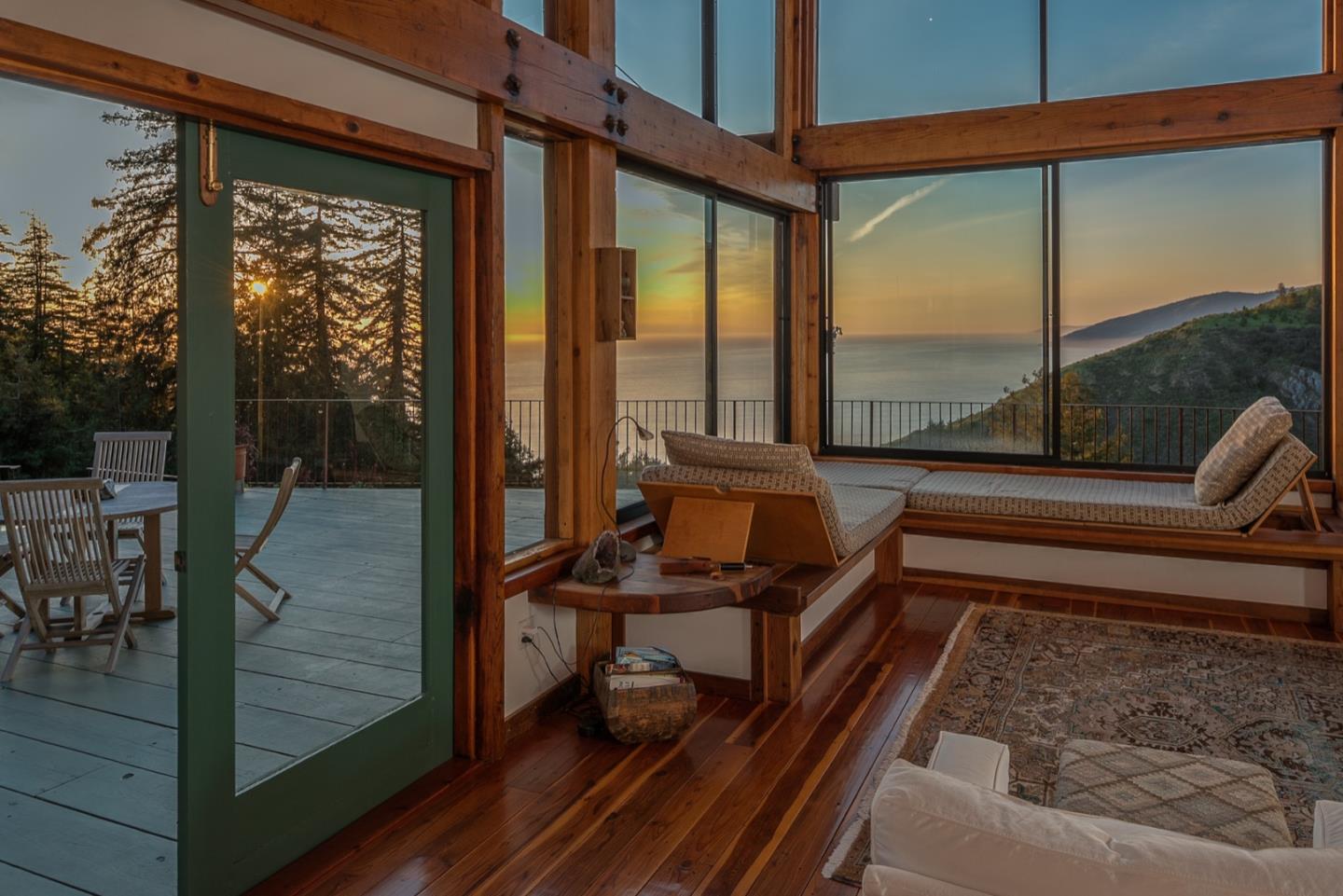 29141 Plasket Ridge Road Big Sur, CA 93920 - Photo 13 of 48 a room with furniture and a large window