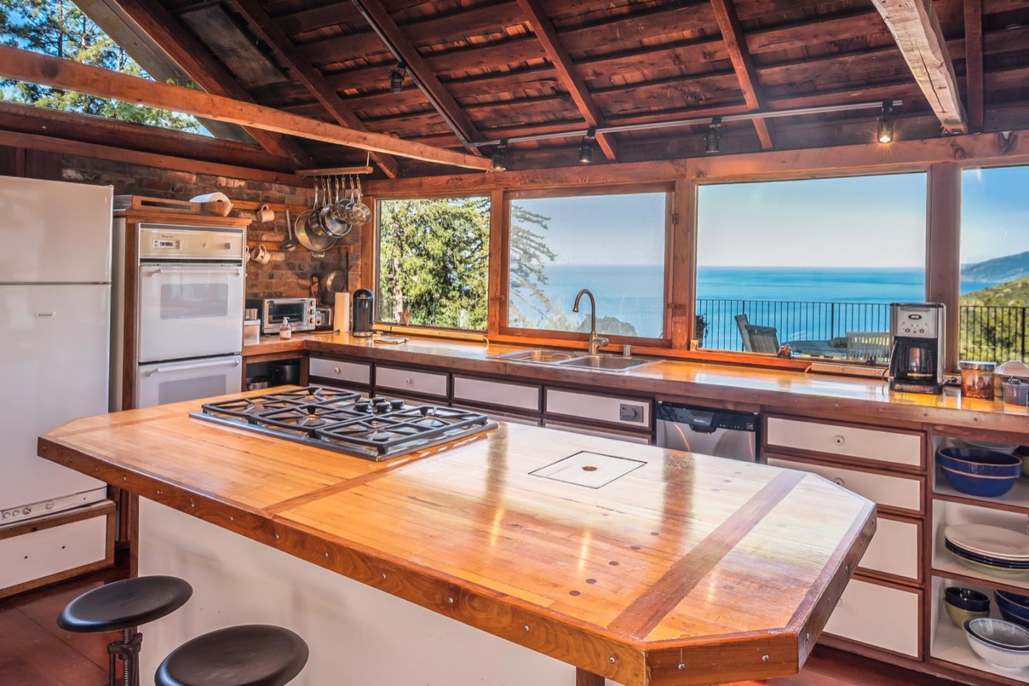 29141 Plasket Ridge Road Big Sur, CA 93920 - Photo 21 of 48 a room with furniture and window