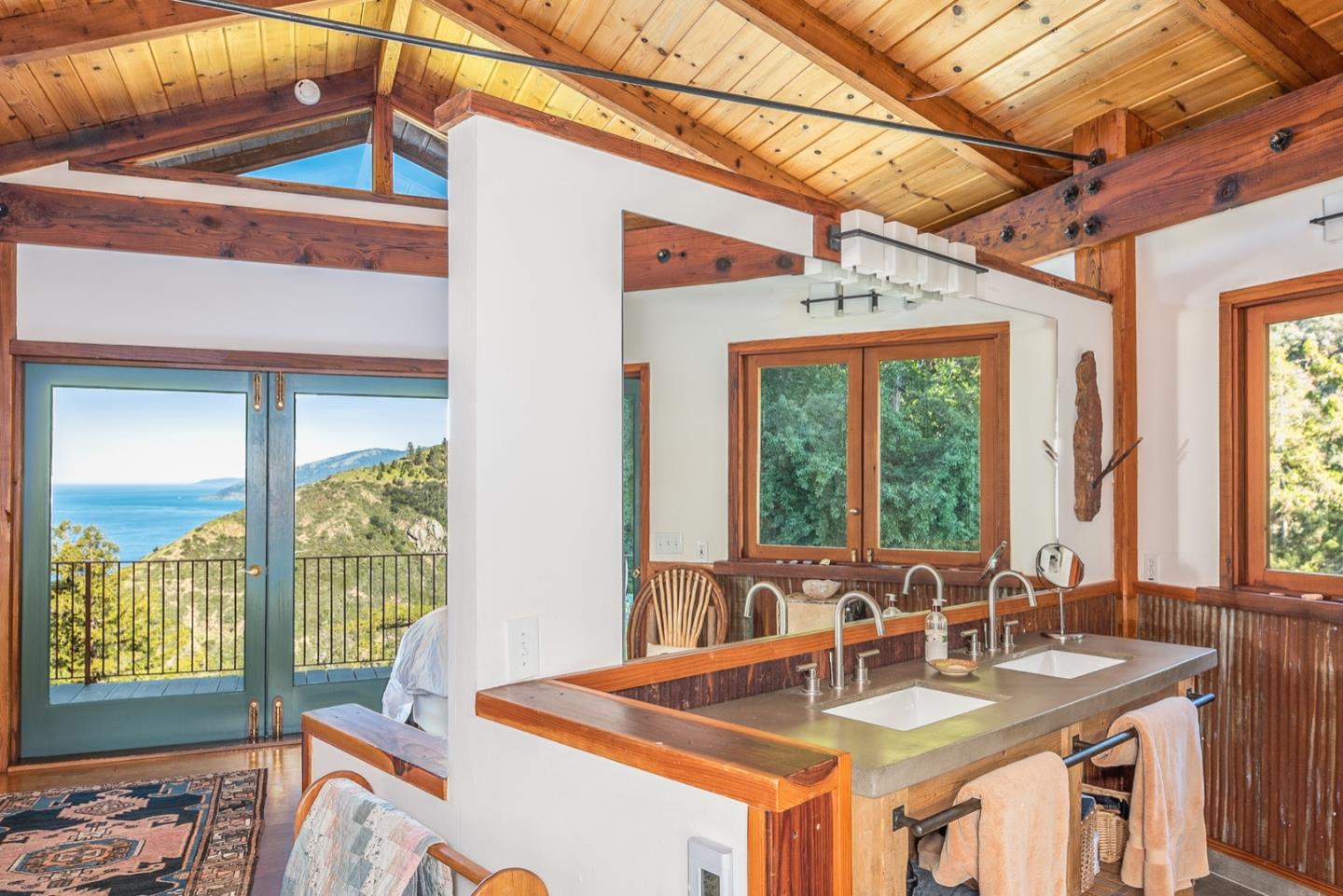 29141 Plasket Ridge Road Big Sur, CA 93920 - Photo 25 of 48 a dining room with large window