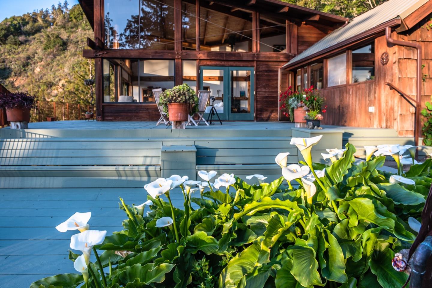 29141 Plasket Ridge Road Big Sur, CA 93920 - Photo 34 of 48 a front view of a house with a yard