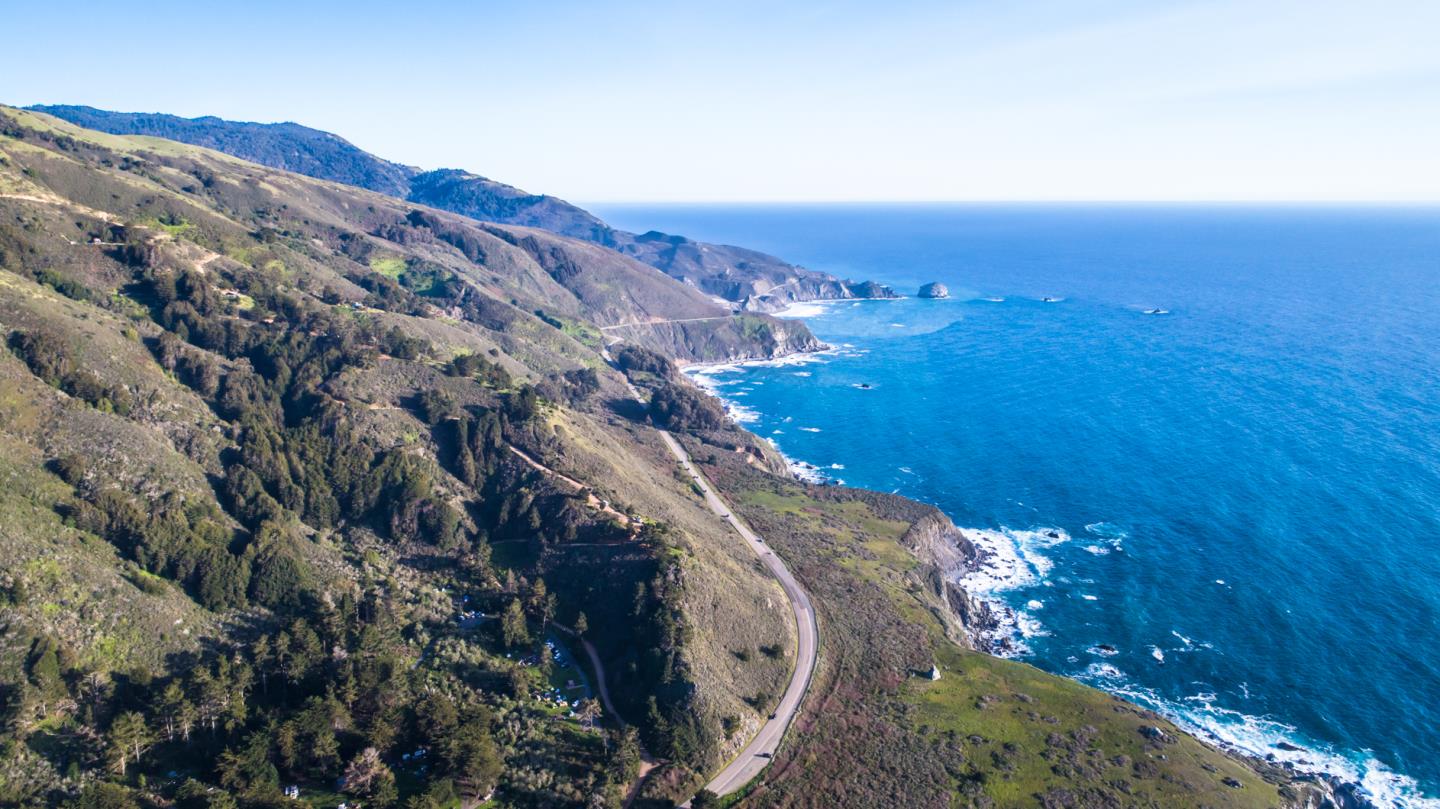 29141 Plasket Ridge Road Big Sur, CA 93920 - Photo 47 of 48 a view of a big yard with mountains in the background