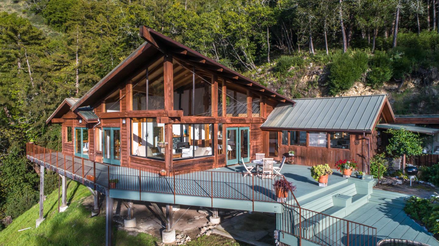 29141 Plasket Ridge Road Big Sur, CA 93920 - Photo 7 of 48 a view of a house with backyard and sitting area